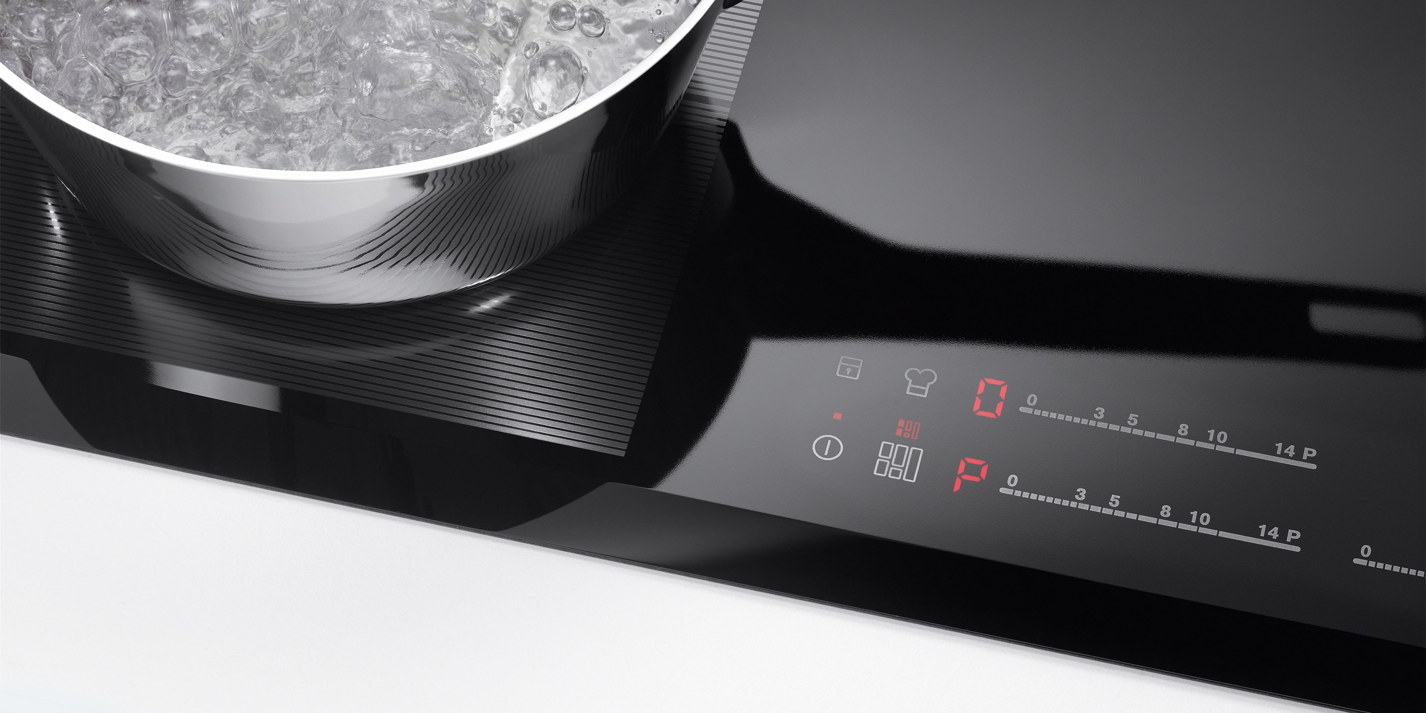 Az Electrolux indukciós főzőlap leállító- és indítógombja
