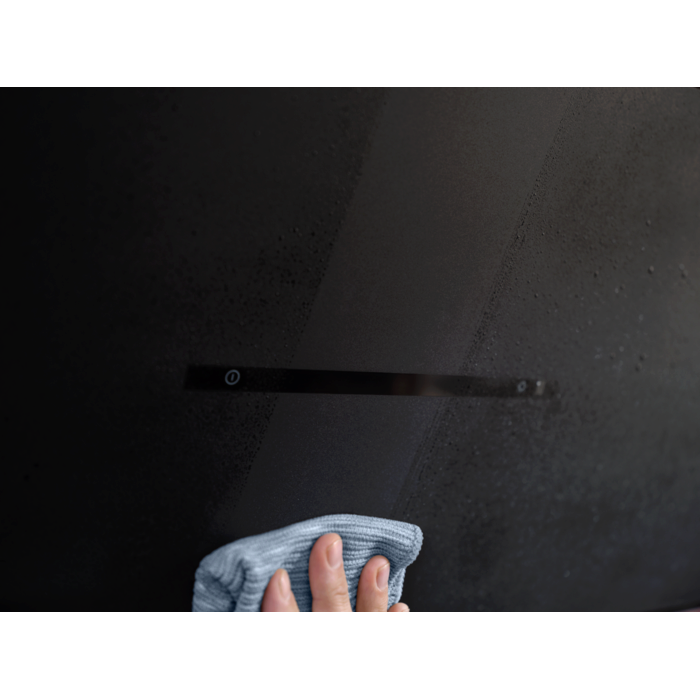 The textural-looking, matt black glass is easy to clean.